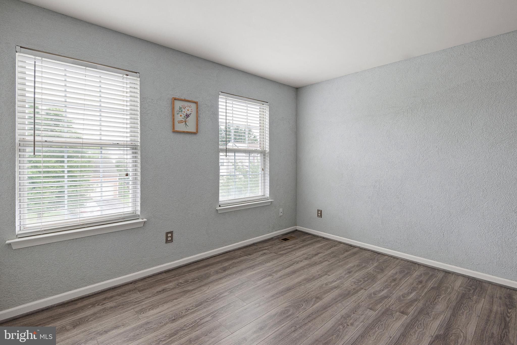 3 Kerrin Road Bear, DE 19701 - Photo 23 of 25 a view of a room with wooden floor and window