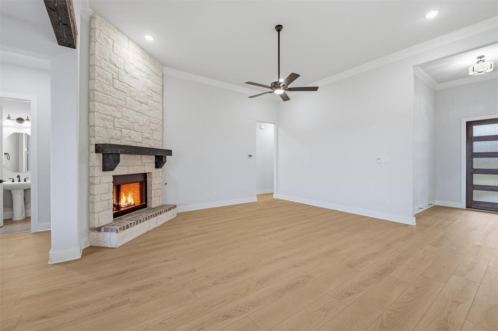 809 Vly Rdg Road Van Alstyne, TX 75495 - Photo 19 of 30 a view of an empty room with fire place and a fireplace