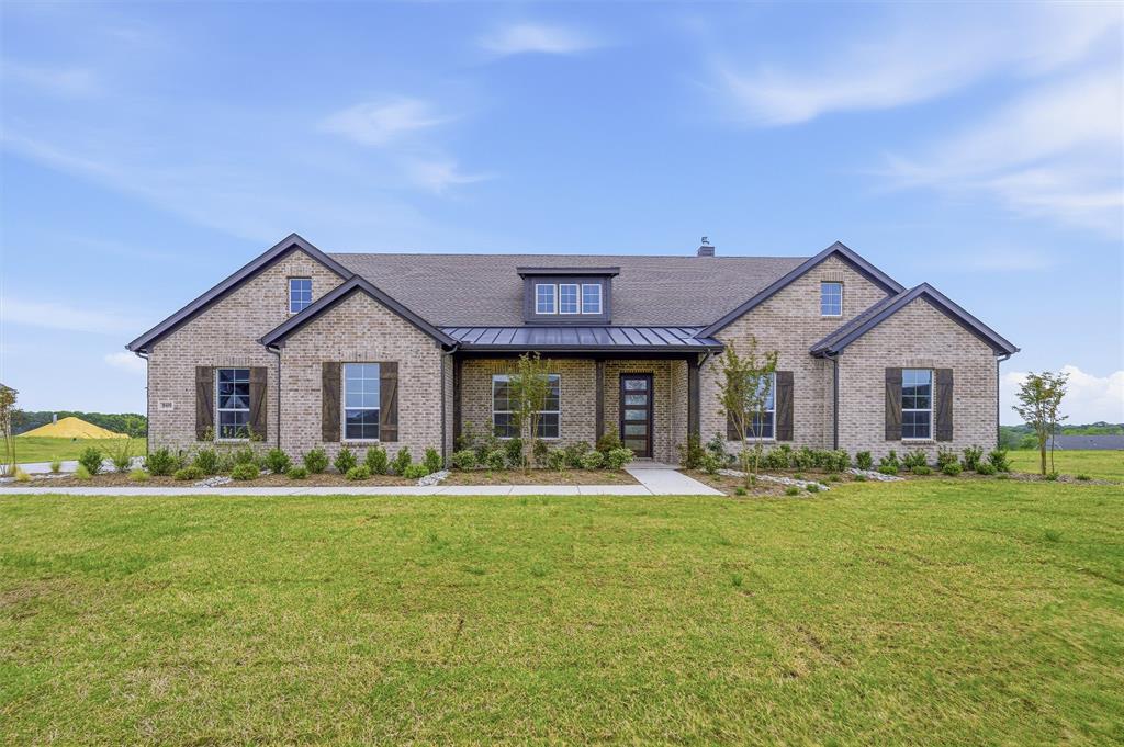 809 Vly Rdg Road Van Alstyne, TX 75495 - Photo 3 of 30 a front view of a house with a yard