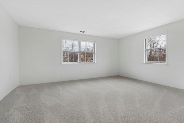 200 Bedford Road, Unit 26F Woburn, MA 01801 - Photo 4 of 4 an empty room with windows