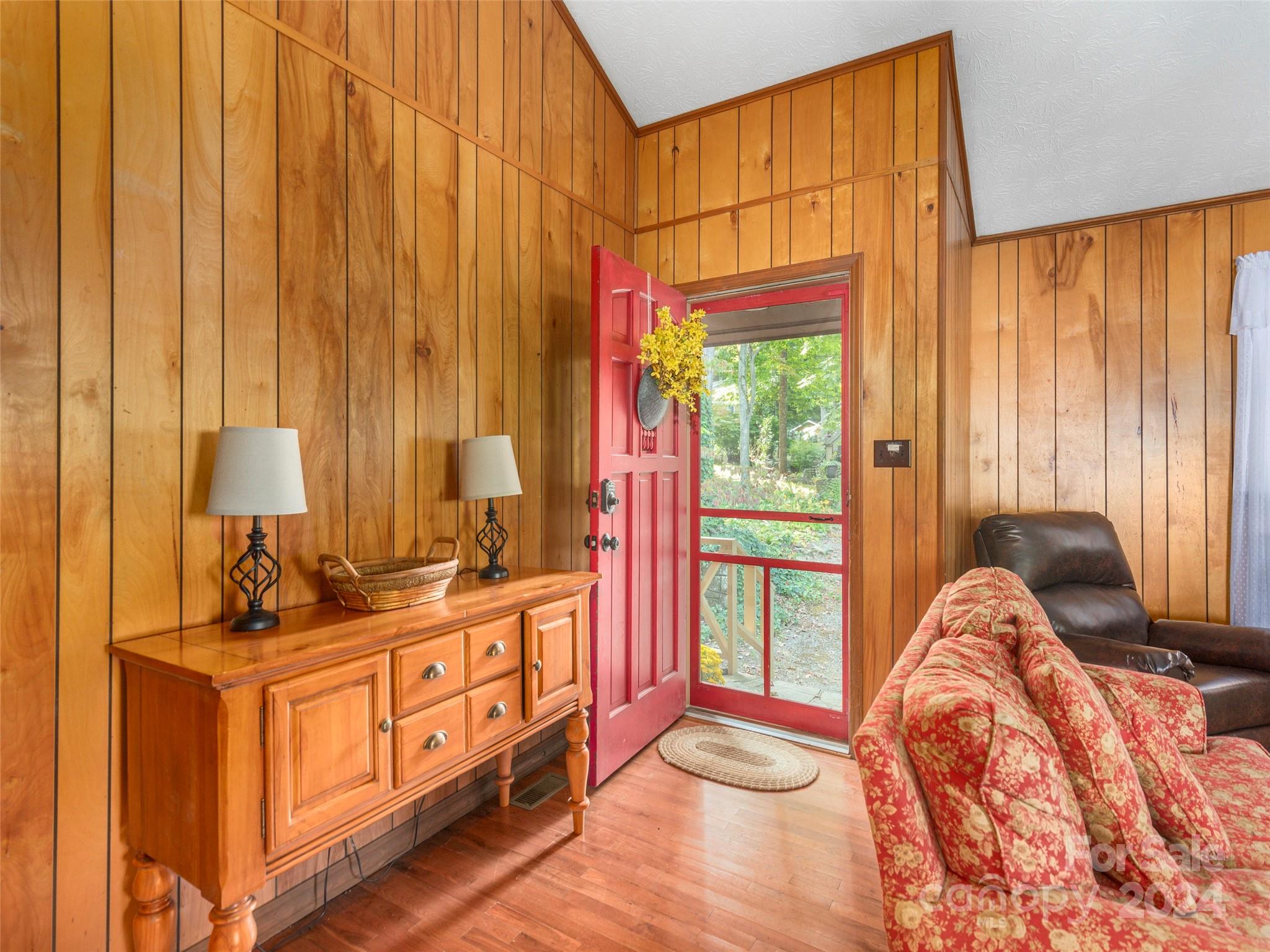 183 Reuben Branch Road Maggie Valley, NC 28751 - Photo 4 of 29 a bed room with a bed and a window
