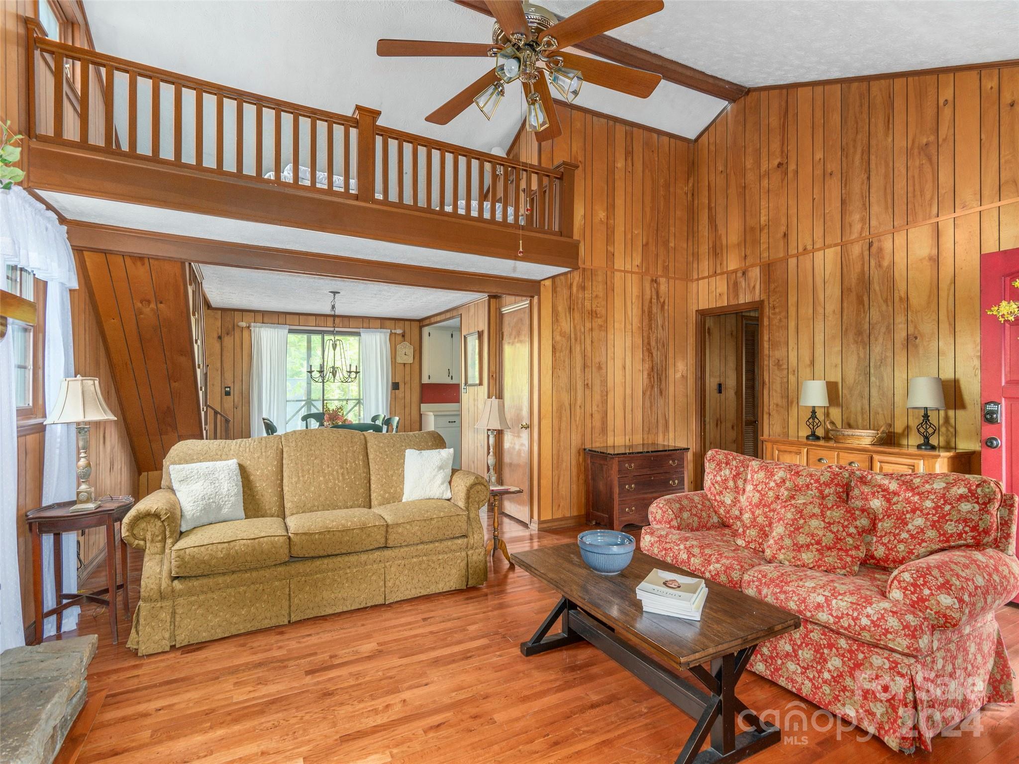 183 Reuben Branch Road Maggie Valley, NC 28751 - Photo 7 of 29 a living room with furniture and a window