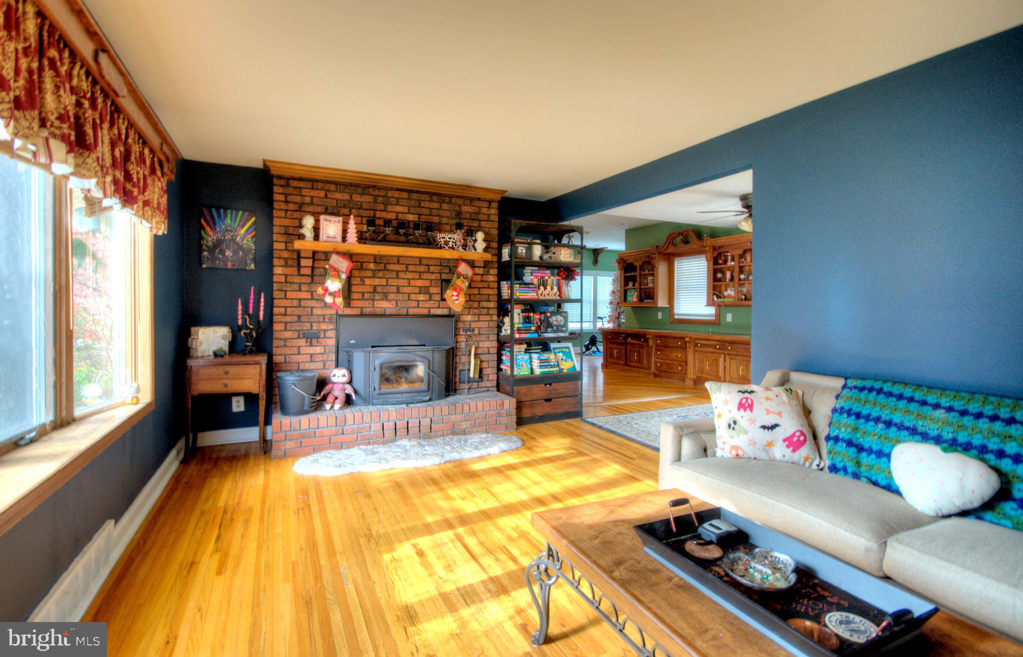 10 Linden Road Bordentown, NJ 08505 - Photo 16 of 70 a bed room with a bed and a fireplace