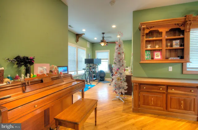 a bedroom with a bed and a dresser in it