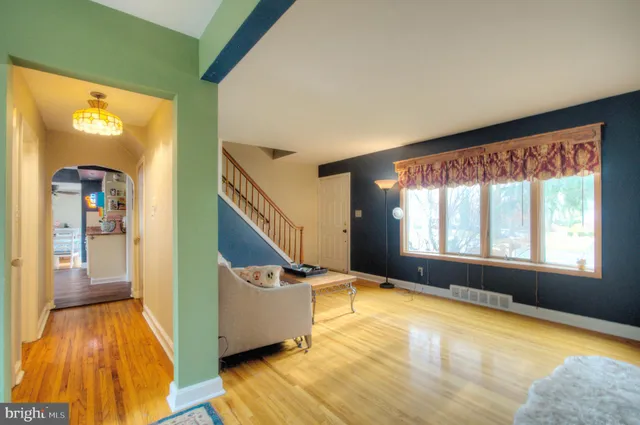 a bedroom with a bed and furniture