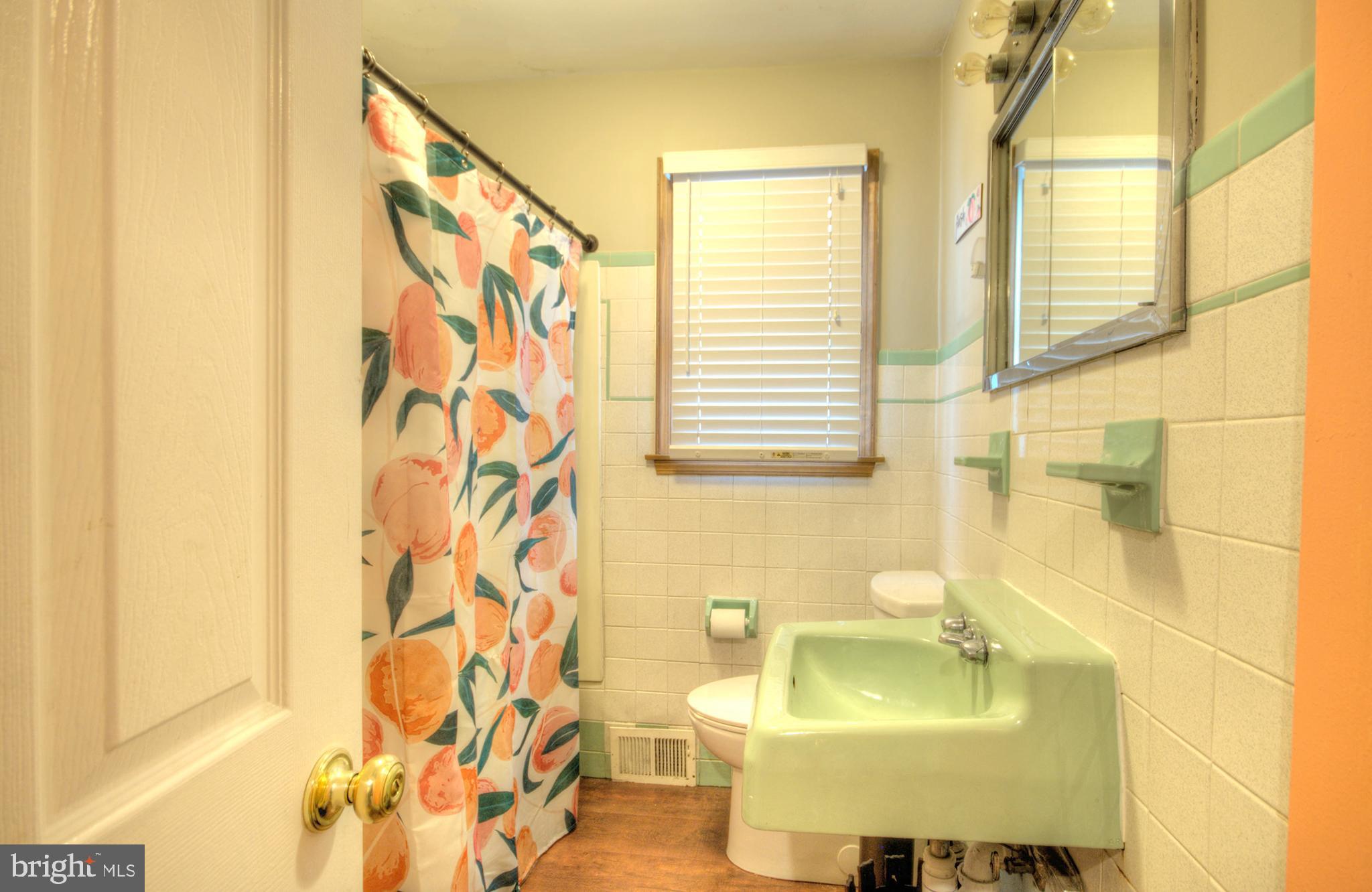 10 Linden Road Bordentown, NJ 08505 - Photo 30 of 70 a bathroom with a sink toilet and shower