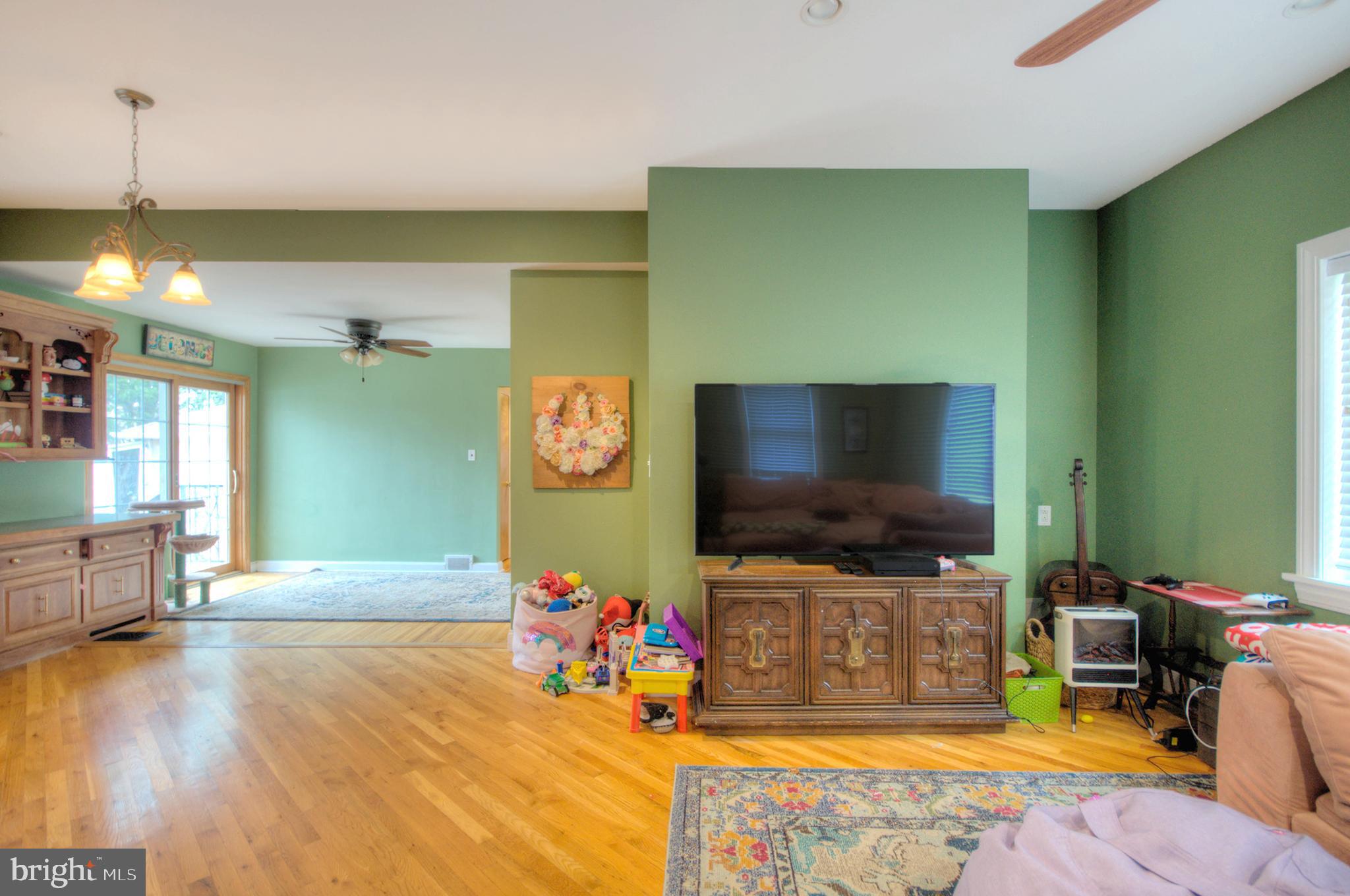 10 Linden Road Bordentown, NJ 08505 - Photo 33 of 70 a living room with furniture and a flat screen tv