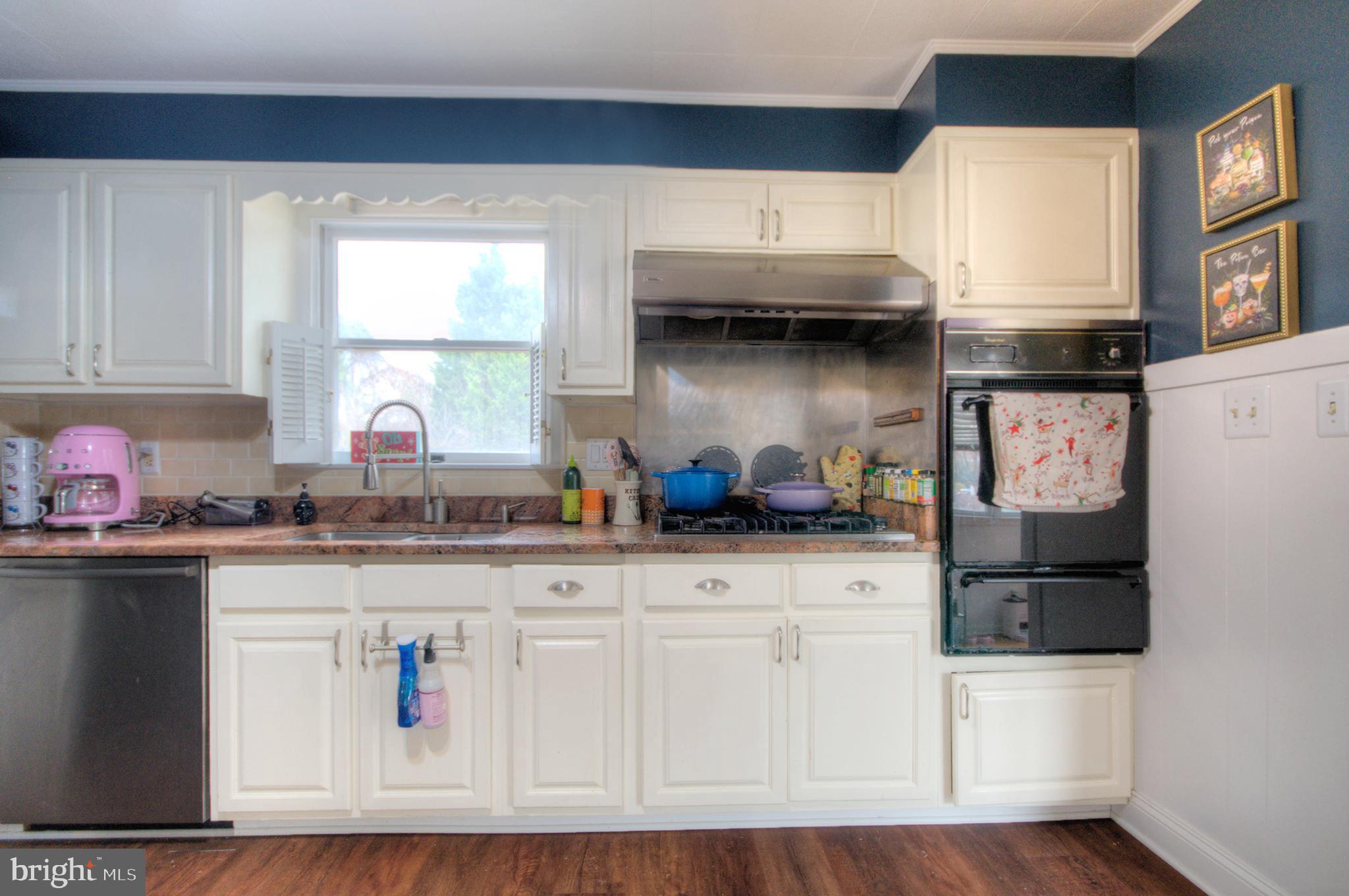 10 Linden Road Bordentown, NJ 08505 - Photo 40 of 70 a kitchen with stainless steel appliances a sink a stove and cabinets