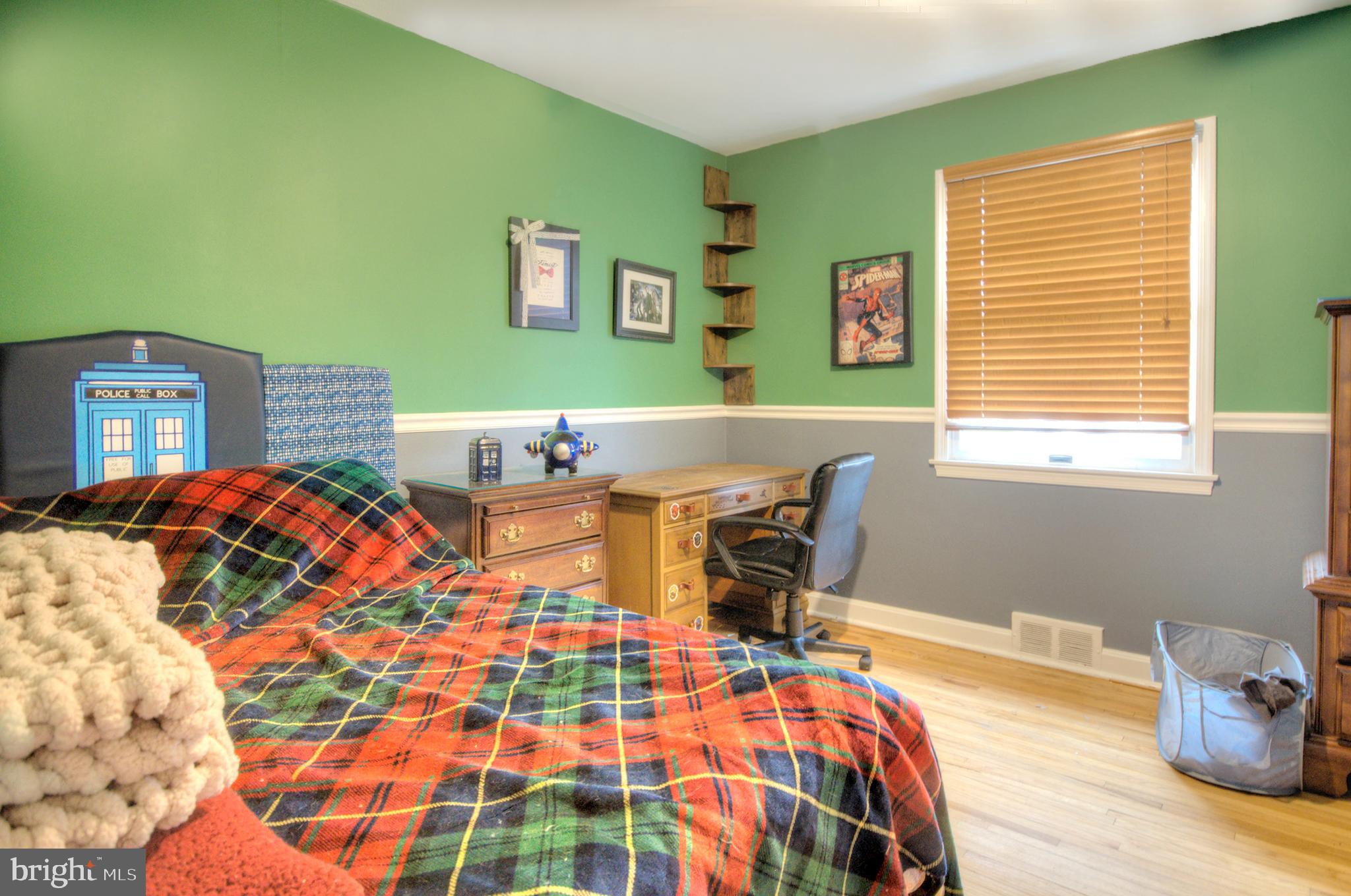 10 Linden Road Bordentown, NJ 08505 - Photo 42 of 70 a bedroom with a bed and wooden floor