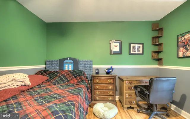 a bedroom with a bed and a walk in closet