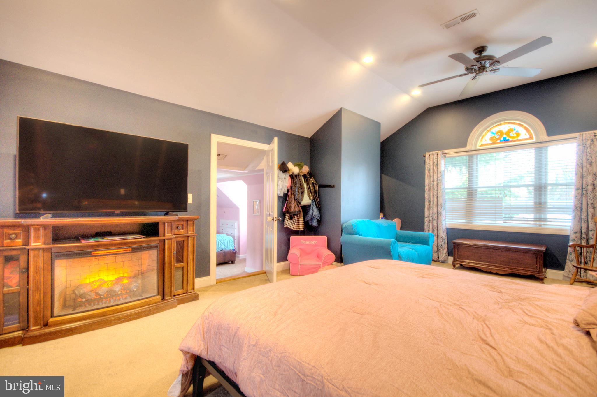 10 Linden Road Bordentown, NJ 08505 - Photo 50 of 70 a bedroom with a bed and a flat screen tv