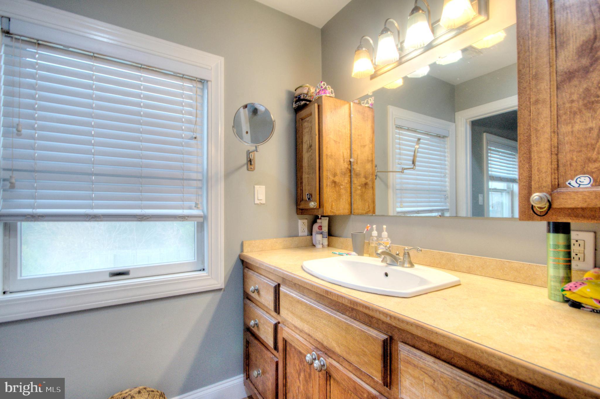 10 Linden Road Bordentown, NJ 08505 - Photo 55 of 70 a bathroom with a sink and a mirror