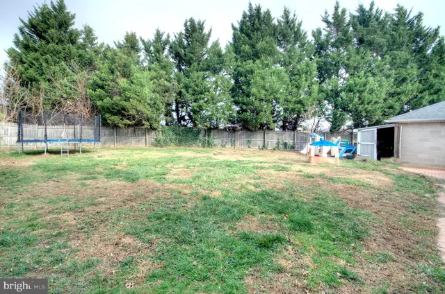 a view of an entryway and livingroom with furniture
