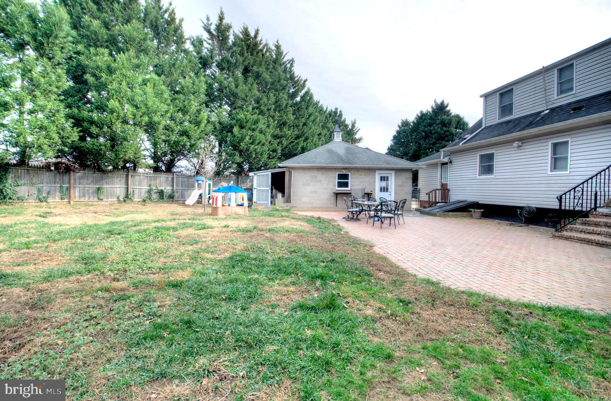 10 Linden Road Bordentown, NJ 08505 - Photo 10 of 70 a backyard of a house with yard barbeque oven and outdoor seating