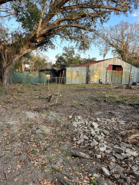 Dover Road Dover, FL 33527 - Photo 2 of 3 a view of a yard in front of a house with large trees