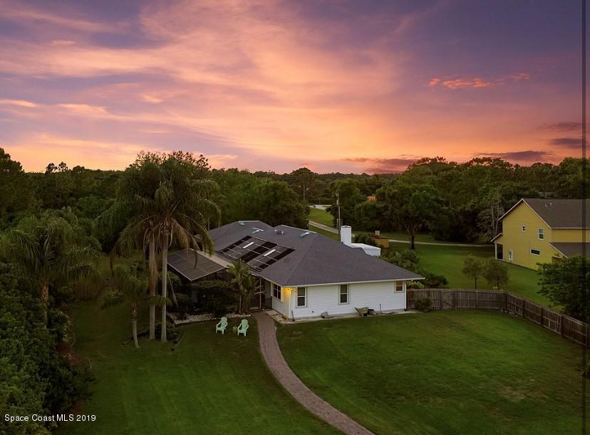 4231 Turtle Mound Road Melbourne, FL 32934 - Photo 1 of 39 an aerial view of a house