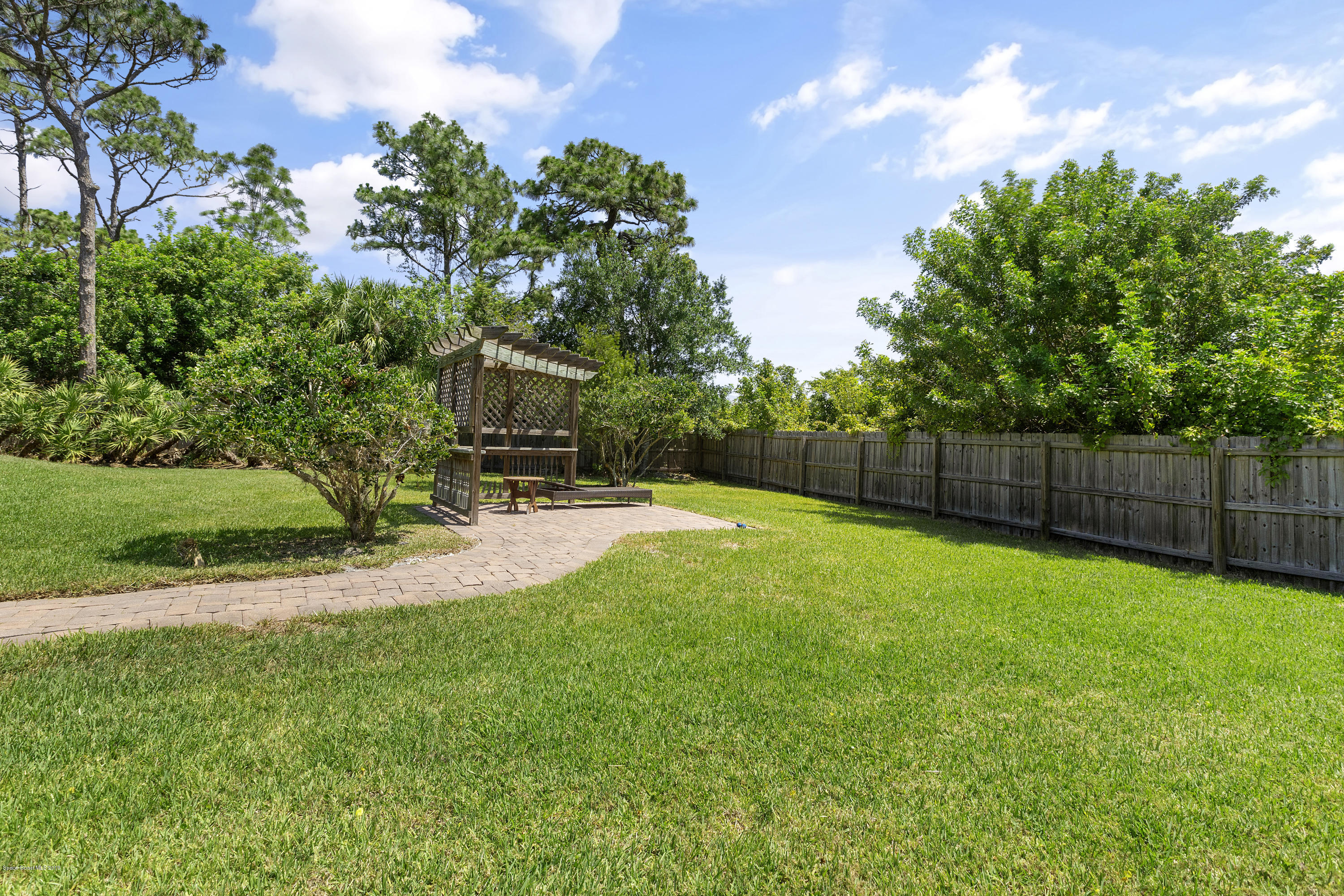 4231 Turtle Mound Road Melbourne, FL 32934 - Photo 36 of 39 a view of a backyard