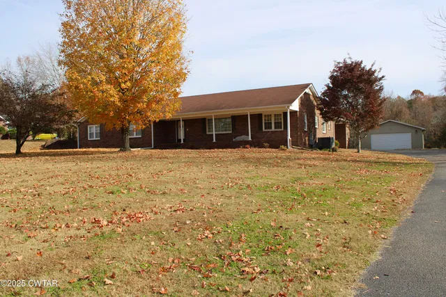 a house view with a garden space