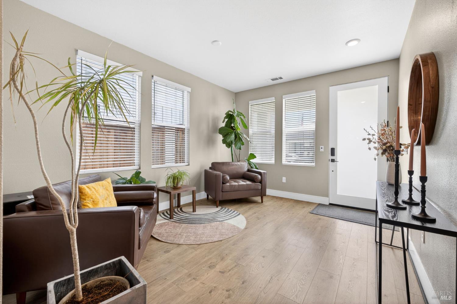 2215-2217 Versaro Drive Santa Rosa, CA 95403 - Photo 5 of 45 a living room with furniture and a flat screen tv