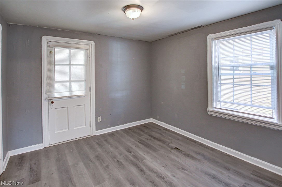 3423 Westbury Road Cleveland, OH 44120 - Photo 38 of 38 Empty room with dark hardwood / wood-style flooring