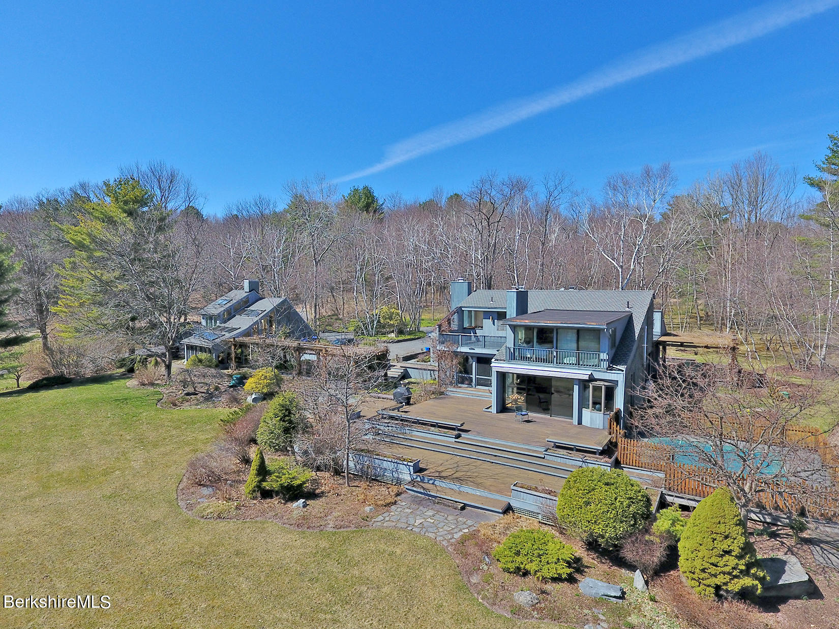 12 Red Rock Road West Stockbridge, MA 01266 - Photo 3 of 31 a view of a house with a garden and sitting area
