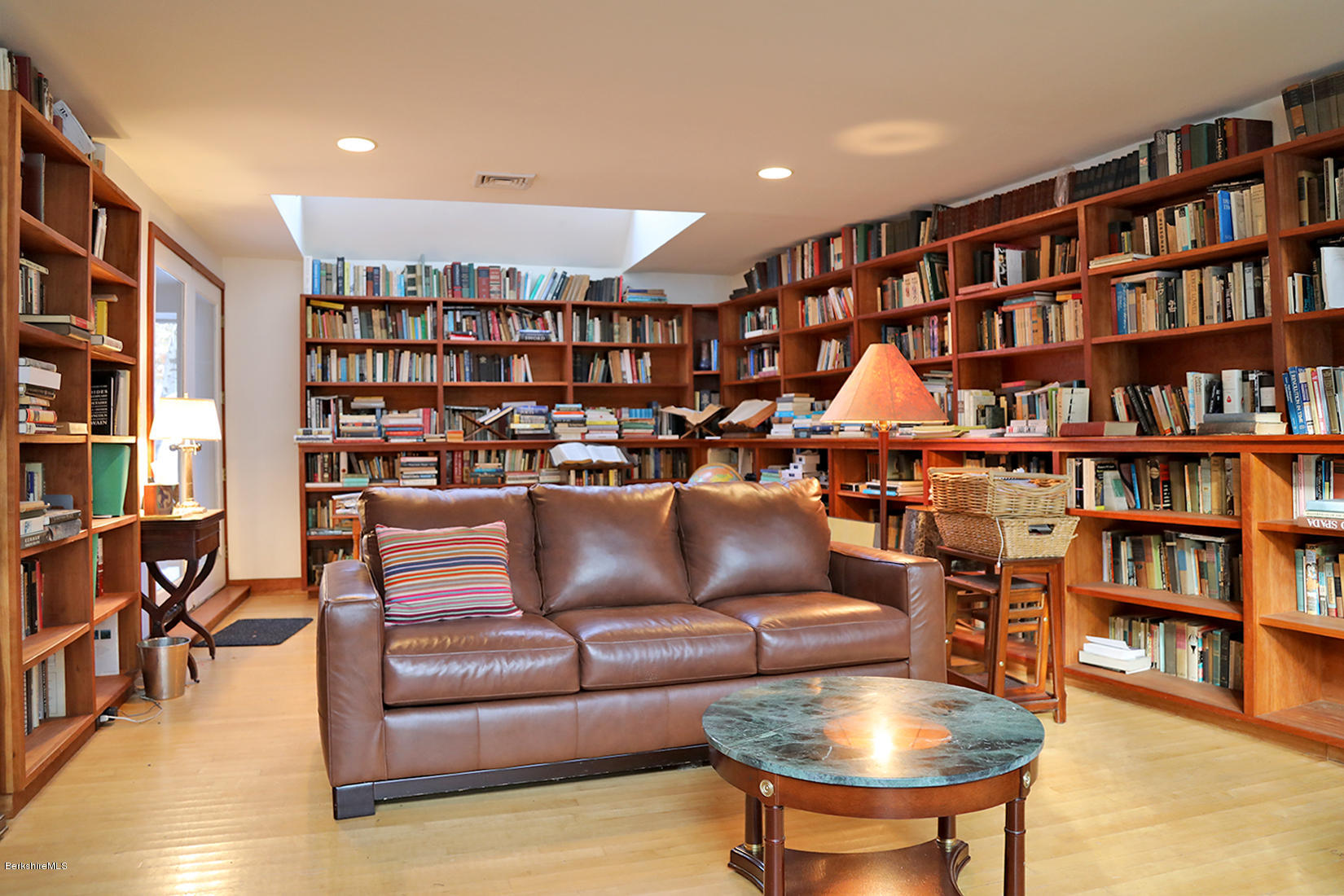 12 Red Rock Road West Stockbridge, MA 01266 - Photo 23 of 31 a living room with furniture and a book shelf