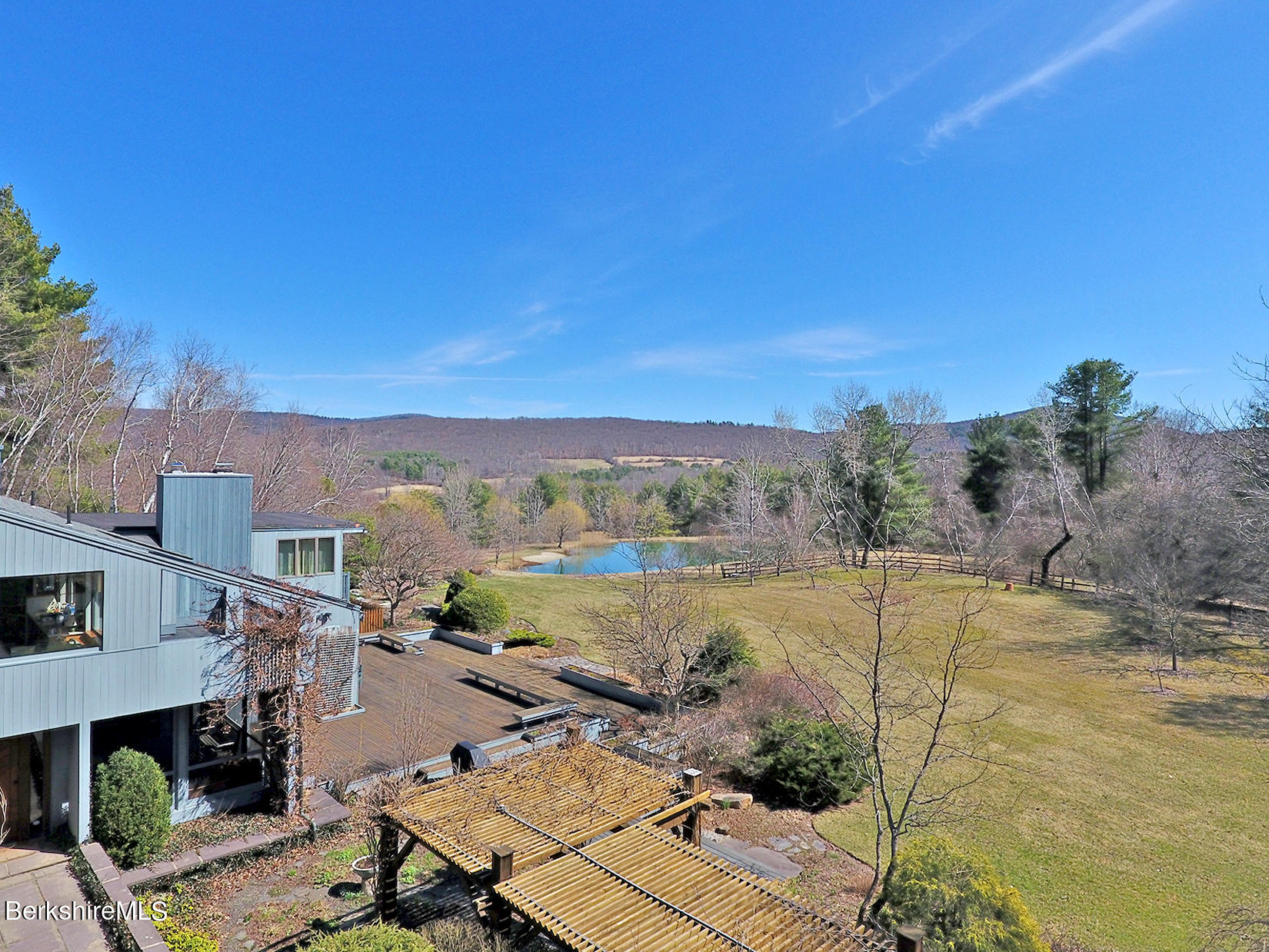 12 Red Rock Road West Stockbridge, MA 01266 - Photo 27 of 31 a view of a lake with a yard