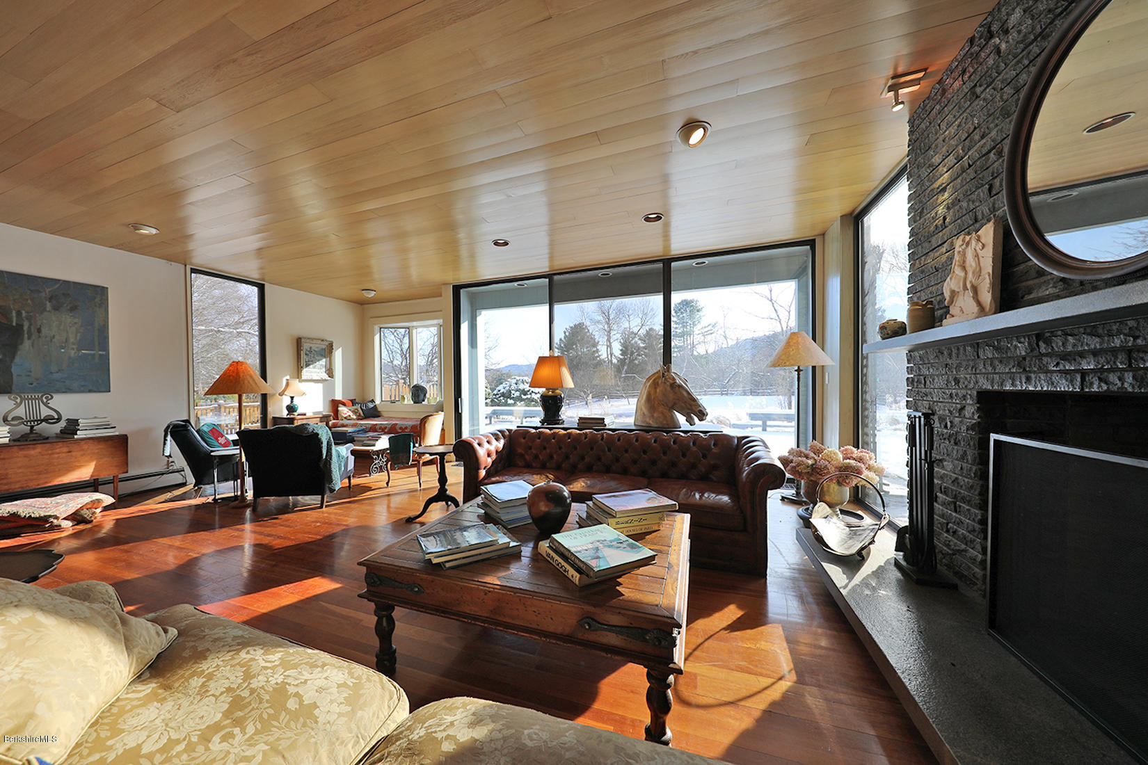 12 Red Rock Road West Stockbridge, MA 01266 - Photo 8 of 31 a living room with furniture fireplace and a large window
