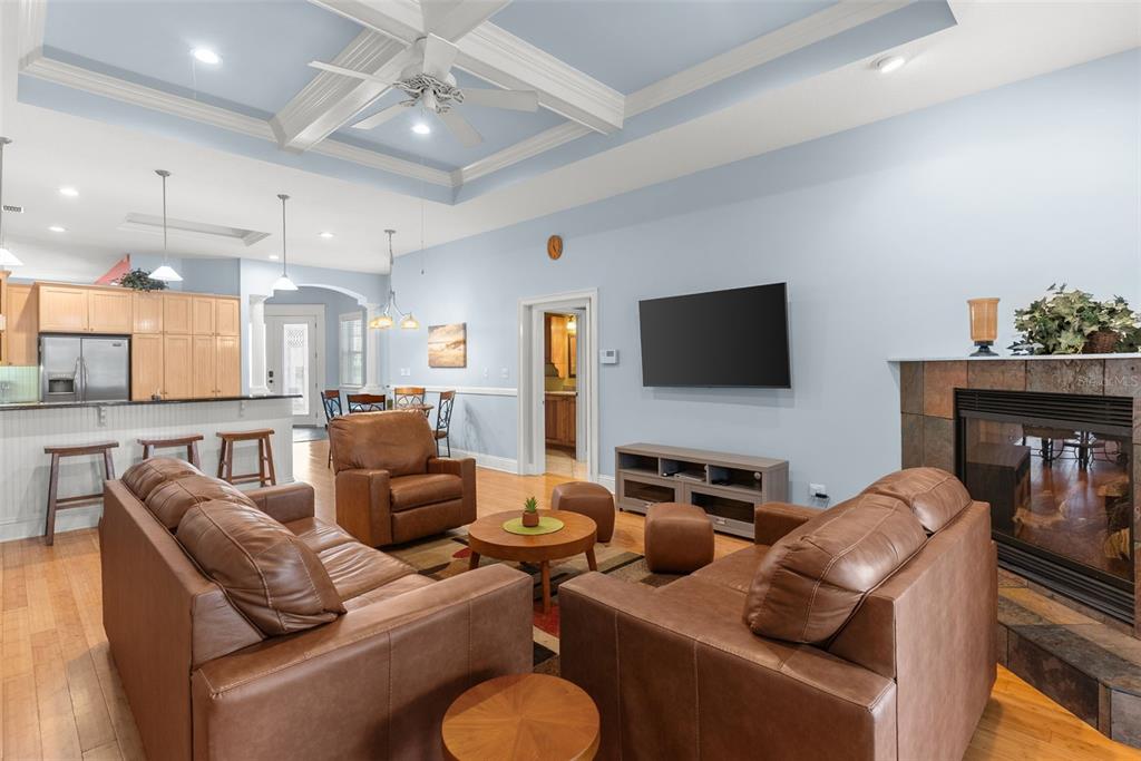 12080 143rd Street North Largo, FL 33774 - Photo 12 of 49 a living room with furniture and a flat screen tv
