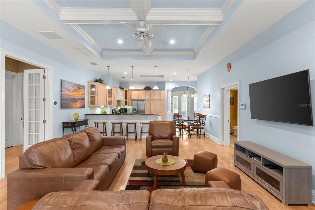 12080 143rd Street North Largo, FL 33774 - Photo 13 of 49 a living room with furniture and a flat screen tv