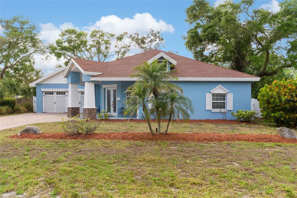 12080 143rd Street North Largo, FL 33774 - Photo 3 of 49 a house view with a garden space