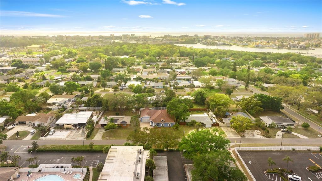 12080 143rd Street North Largo, FL 33774 - Photo 40 of 49 an aerial view of residential houses with outdoor space