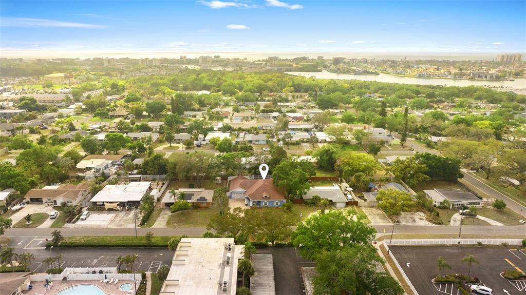 12080 143rd Street North Largo, FL 33774 - Photo 41 of 49 an aerial view of residential building with parking space