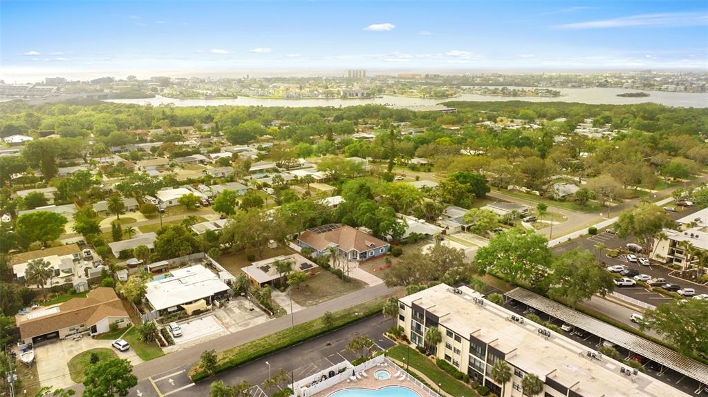 12080 143rd Street North Largo, FL 33774 - Photo 42 of 49 an aerial view of residential houses with outdoor space