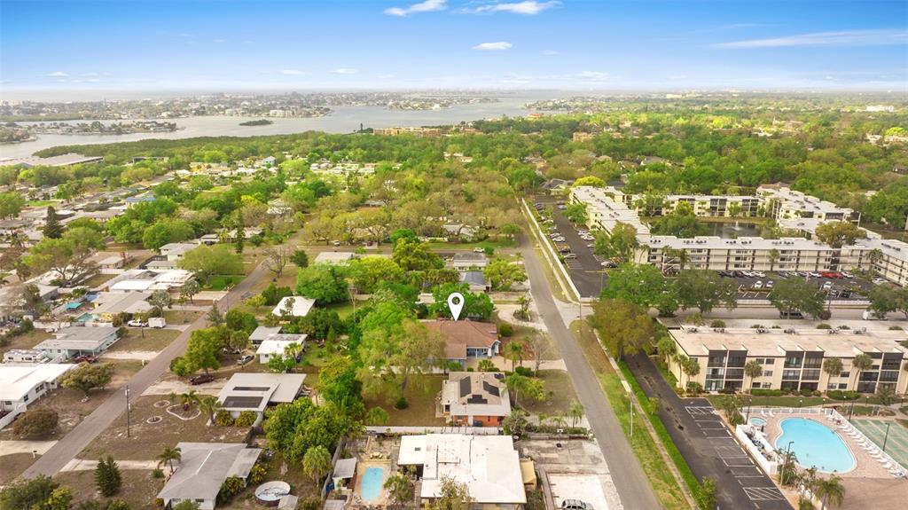 12080 143rd Street North Largo, FL 33774 - Photo 45 of 49 an aerial view of residential building with parking space