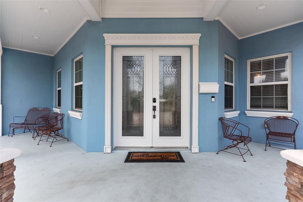 12080 143rd Street North Largo, FL 33774 - Photo 8 of 49 a balcony with furniture and a window