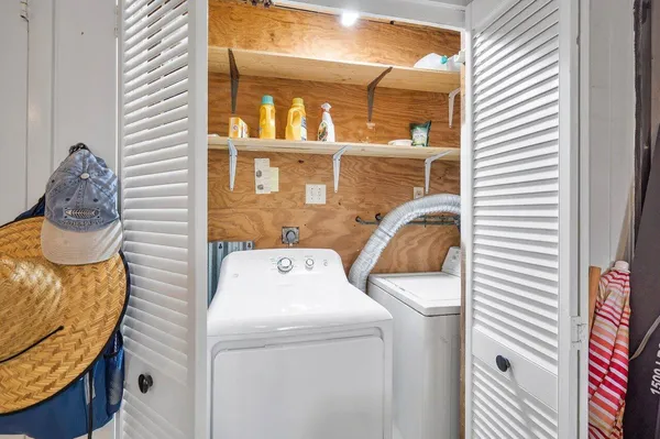 a utility room with a washer and dryer