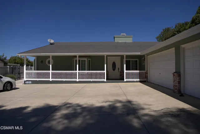 a view of a house with a balcony