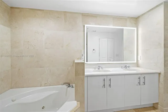 a bathroom with a sink and a bathtub