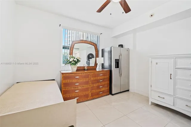 a room with two cabinet and a dresser
