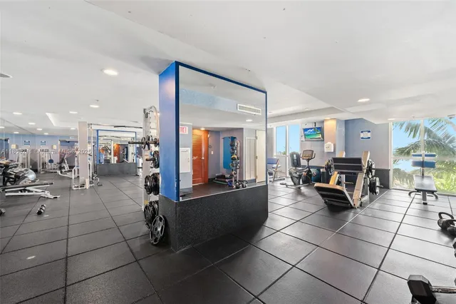 a lobby with furniture and a view of living room