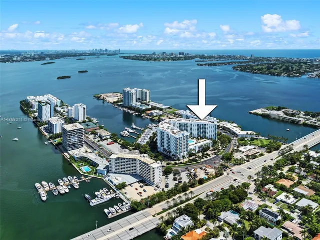 an aerial view of a house with outdoor space