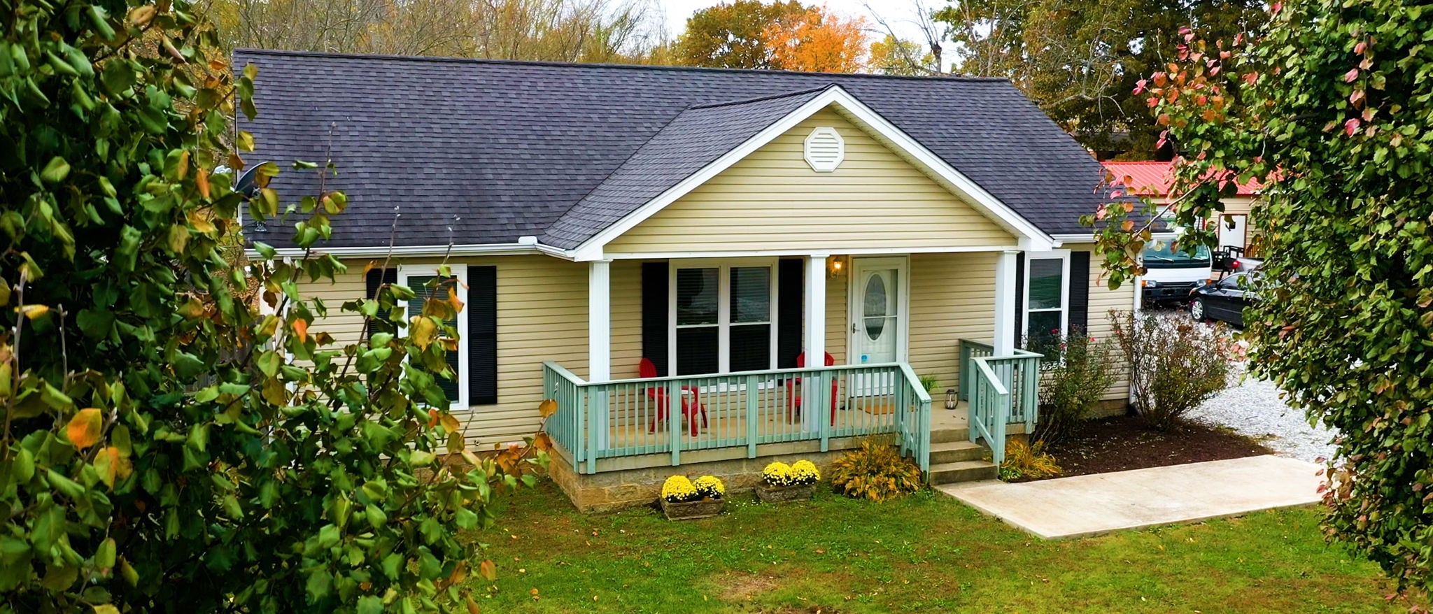 132 Ben Drive Springfield, TN 37172 - Photo 25 of 35 a view of a house with a yard chairs and a large tree
