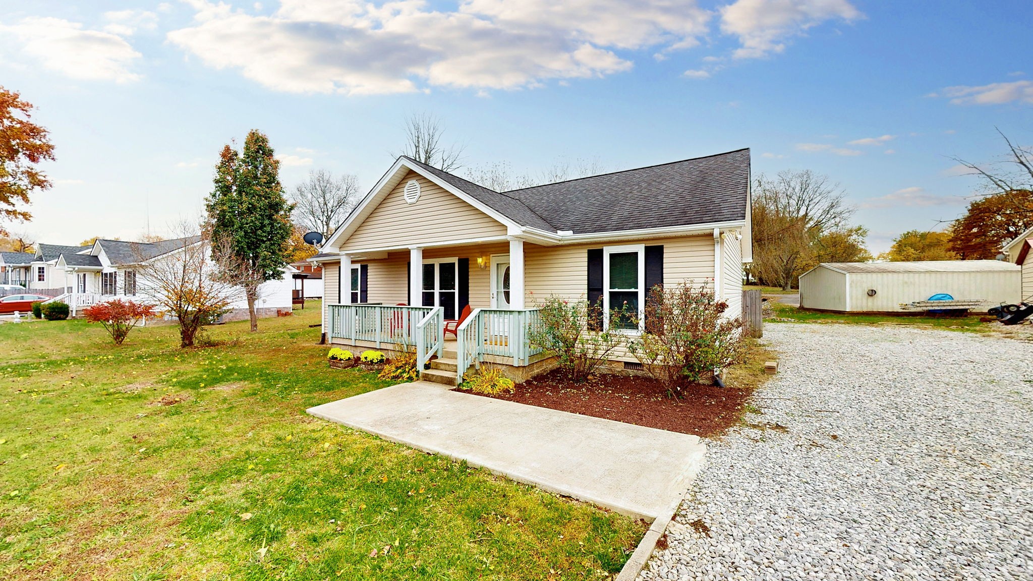 132 Ben Drive Springfield, TN 37172 - Photo 26 of 35 a front view of a house with a yard patio and fire pit