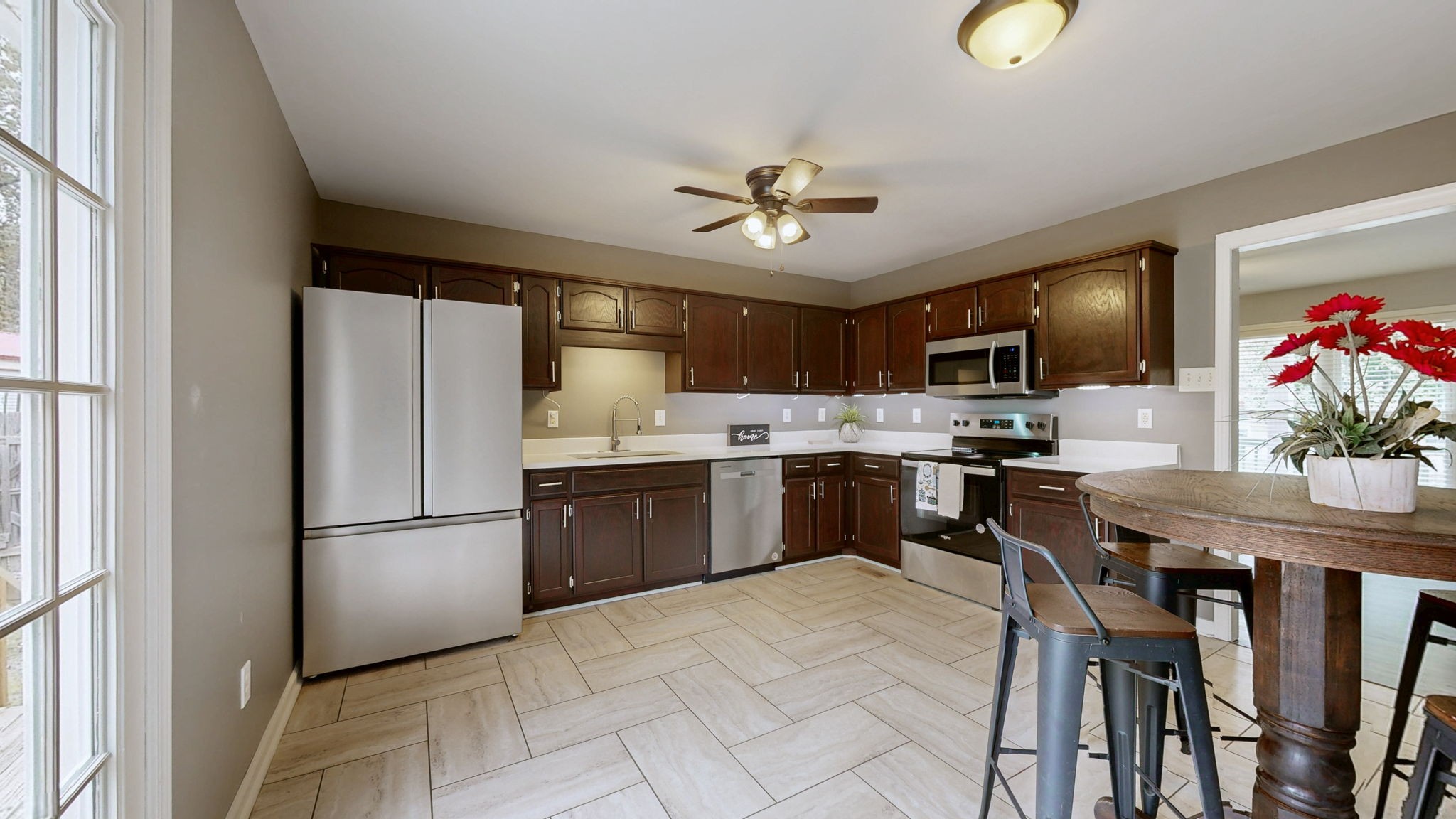 132 Ben Drive Springfield, TN 37172 - Photo 8 of 35 a kitchen with kitchen island a counter top space appliances and cabinets