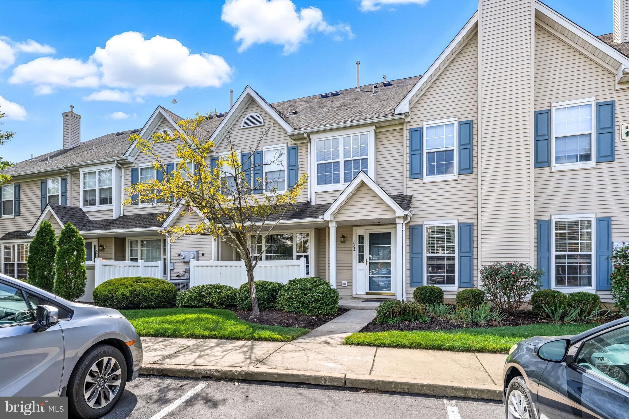 1603 Wharton Road Mount Laurel, NJ 08054 - Photo 1 of 39 a front view of a house with a yard and potted plants
