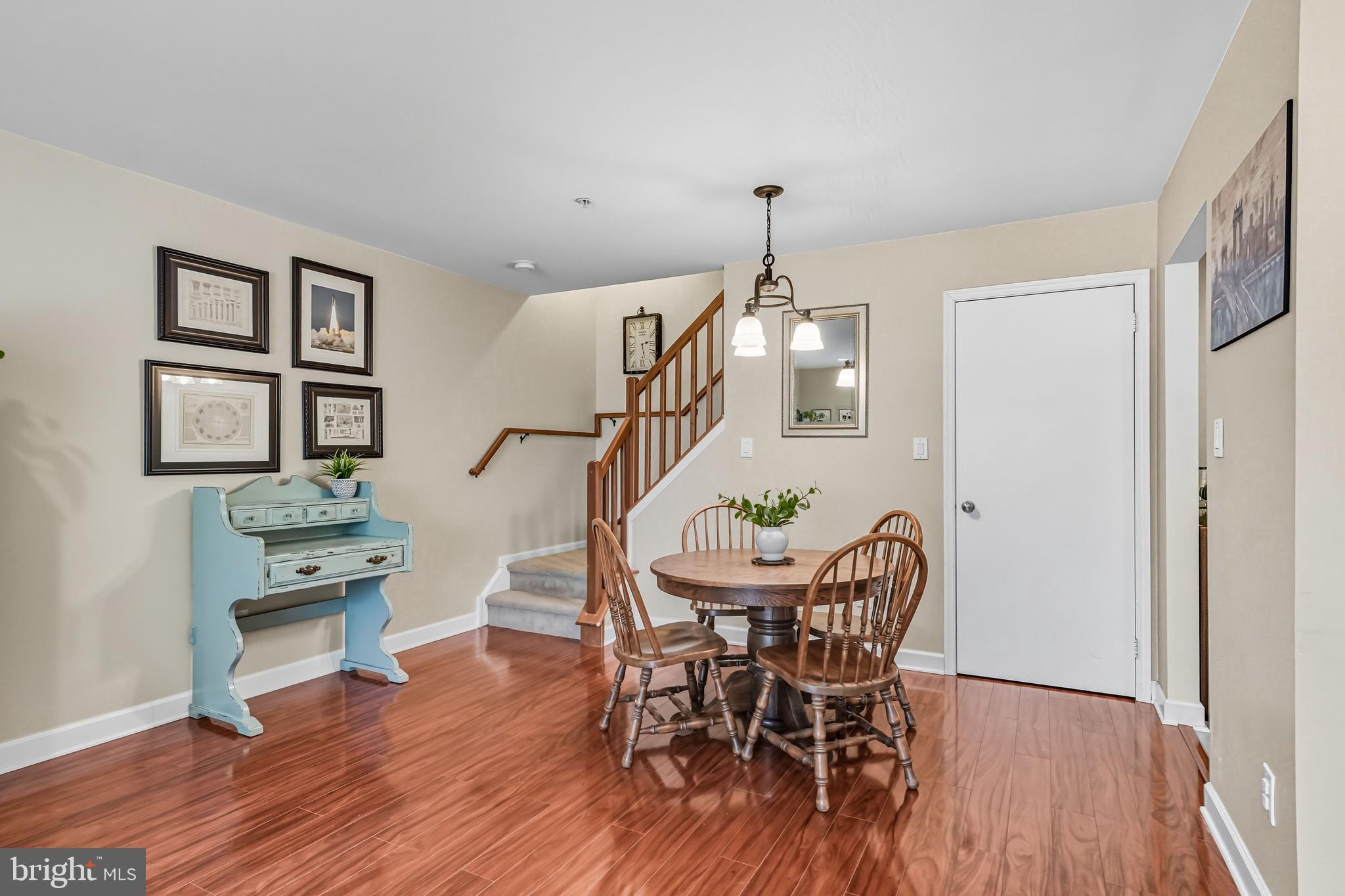1603 Wharton Road Mount Laurel, NJ 08054 - Photo 12 of 39 a view of a dining room with furniture wooden floor and chandelier