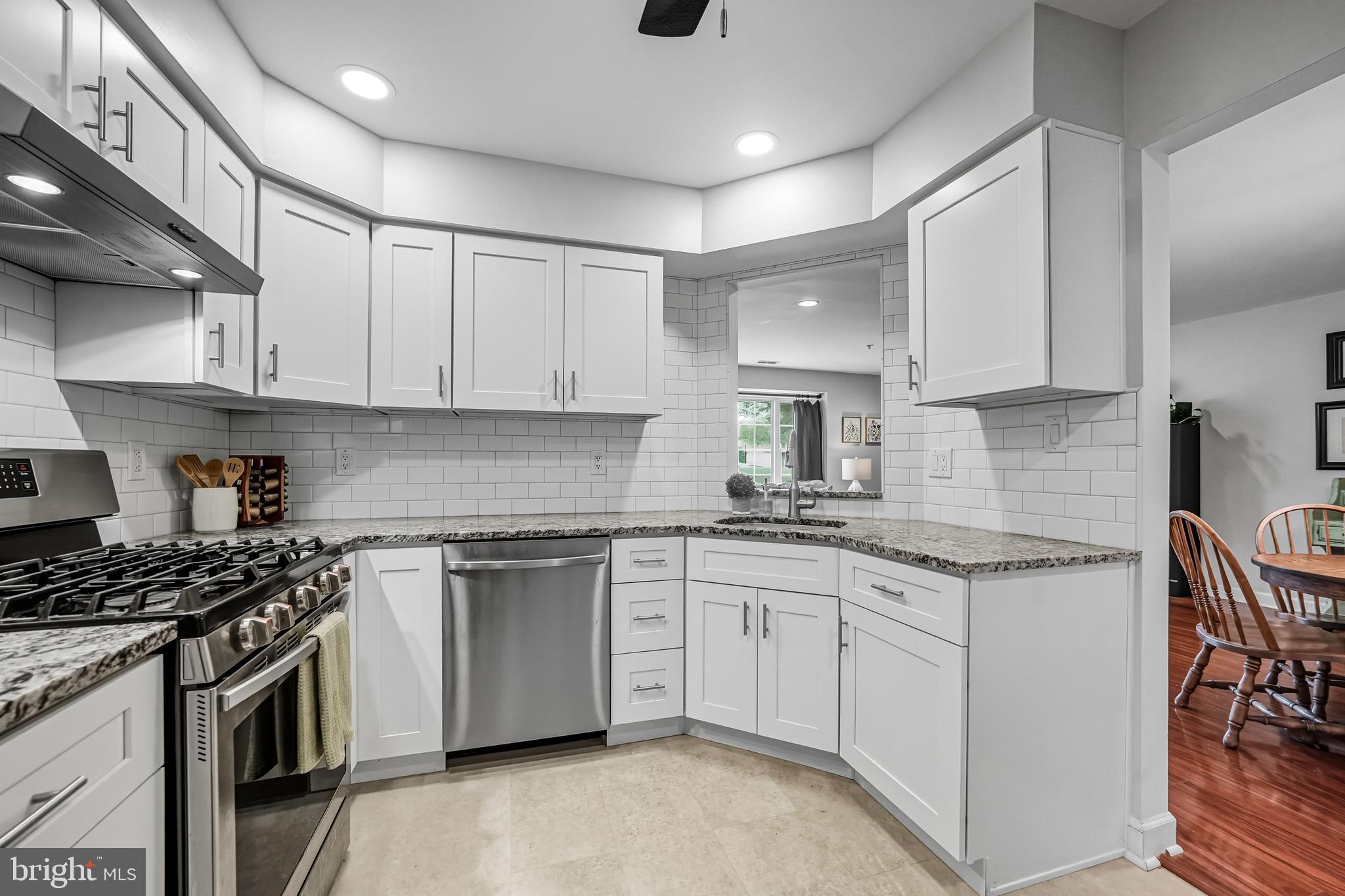 1603 Wharton Road Mount Laurel, NJ 08054 - Photo 16 of 39 a kitchen with granite countertop sink stove top oven and cabinets