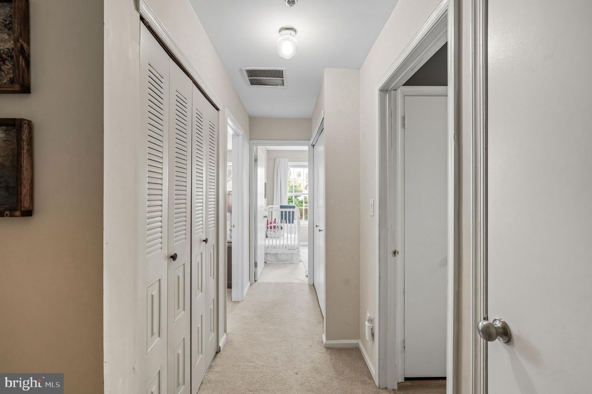 1603 Wharton Road Mount Laurel, NJ 08054 - Photo 20 of 39 a view of a hallway with a wooden door