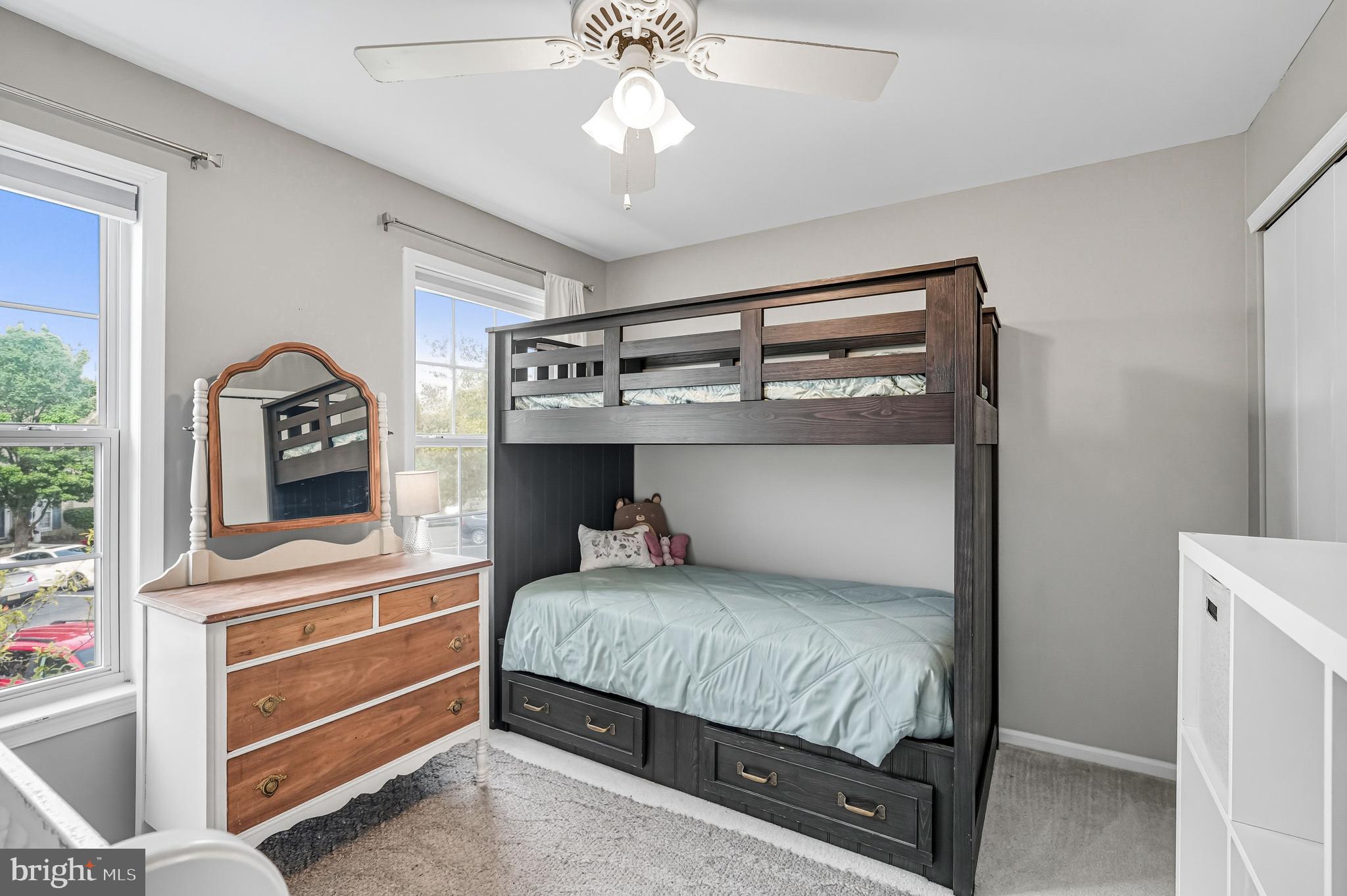 1603 Wharton Road Mount Laurel, NJ 08054 - Photo 22 of 39 a bedroom with a bed and a chandelier